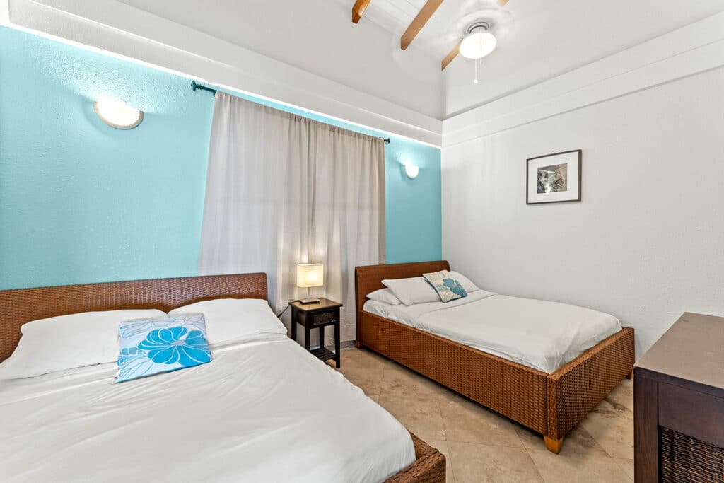 The guest bedroom inside of the 2 bedroom lagoon side rooms at Umaya Resort