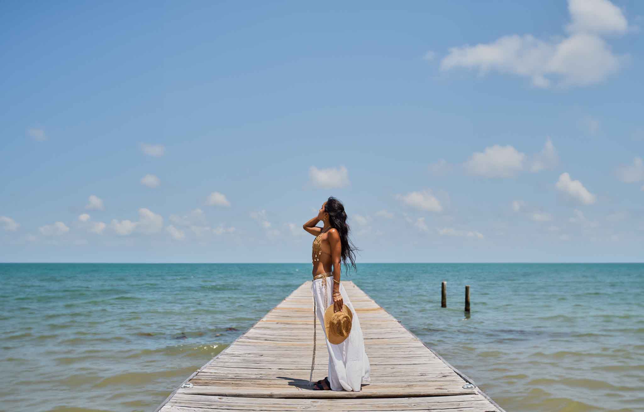 A woman on the dock at Umaya Beach Resort