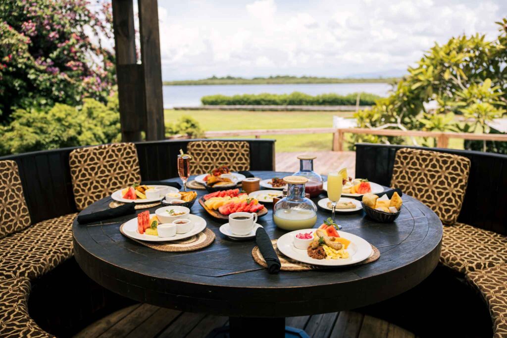 A full table of food at Umaya Resort